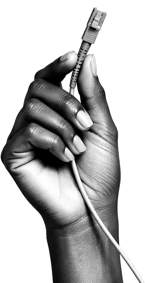 A hand holding a fibre optic cable